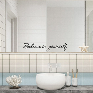 Self-adhesive 'Believe in yourself' wall decal with elegant black cursive lettering