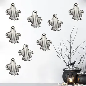 Set of 9 glowing Halloween ghost wall stickers on a wall with dark festive decor
