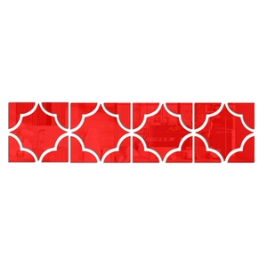 Macro detail of red acrylic mirror wall decals with geometric镂空pattern for home decor
