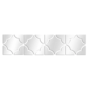 Detail view of four silver mirrored acrylic wall stickers with hollow quatrefoil patterns