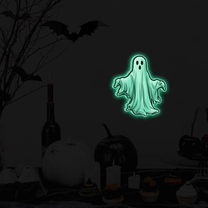 Luminous Halloween ghost wall stickers glowing green in a dark festive room setting