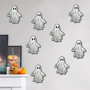 Wall layout of glowing white Halloween ghost stickers with spooky faces for indoor decoration