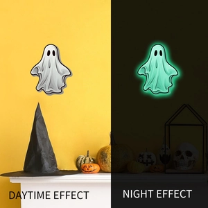 Luminous Halloween ghost stickers showing day and night glow effects for wall decor