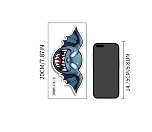 Glow-in-the-dark blue monster sticker with 20cm height measurement and phone for scale