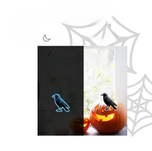 Luminous crow wall stickers showing daytime black look and blue glowing night effect