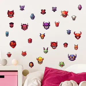 Glow-in-the-dark Halloween cartoon demon stickers applied on a white bedroom wall