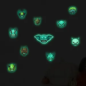 Luminous Halloween stickers featuring ten diverse cartoon ghosts and glowing bat graphics