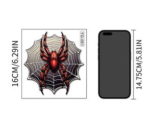 Size comparison of a glowing spider wall sticker next to a smartphone device