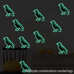 Luminous Halloween crow stickers showing green glow effect on walls in dark room setting