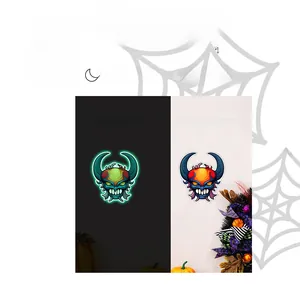 Luminous blue demon mask sticker showing day vs night glowing effect for Halloween decor