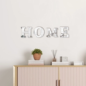 Detail view of reflective 3D acrylic mirror wall stickers forming the word HOME for decor
