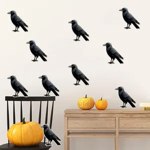 Glow-in-the-dark Halloween crow wall stickers set of 10 applied on furniture and walls