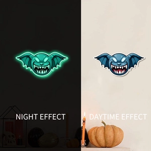 Luminous Halloween wall sticker showing day and night effect with green gargoyle demon