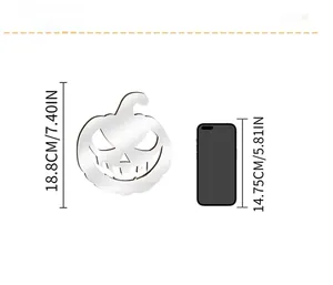 3D acrylic pumpkin wall sticker size comparison with a mobile phone for Halloween decor