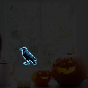 Luminous Halloween crow wall decals with blue neon glow effect on dark window backdrop