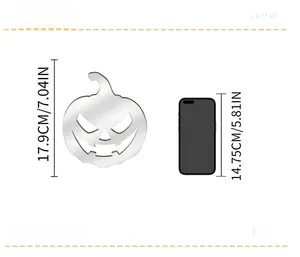 3D acrylic pumpkin wall sticker measuring 7.04 inches high compared to a smartphone