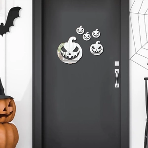 Macro detail of acrylic pumpkin mirror stickers for Halloween room wall and door decor