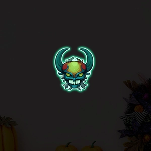 Glow-in-the-dark Halloween skull wall sticker with neon green silhouette on black background