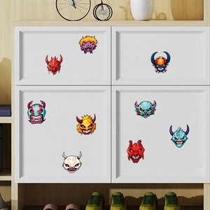 Detailed set of colorful cartoon monster stickers on white cabinet with wood background