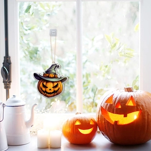 Halloween pumpkin pendant with wizard hat hanging on window with festive decorations