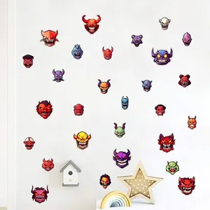 Glow-in-the-dark Halloween cartoon monster wall stickers displayed on a white wall