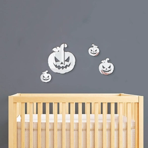 Set of four reflective pumpkin mirror wall stickers for creative Halloween home decor