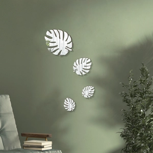 Set of 4 silver acrylic monstera leaf wall stickers in 3D mirror finish for home decor
