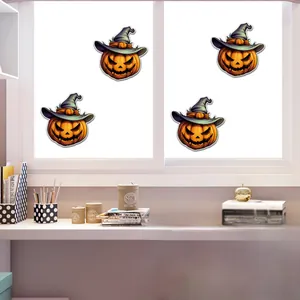 Detailed view of Halloween luminous pumpkin window stickers with wizard hats in a cozy room