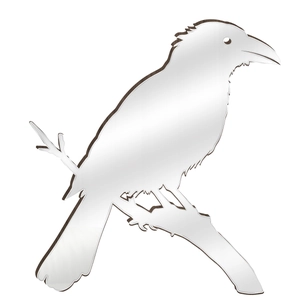 Macro shot of 3D crow wall sticker with silver acrylic mirror finish on dark wood backing