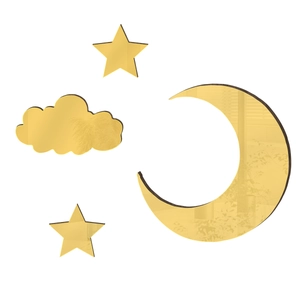 Close-up of gold acrylic mirror moon and stars wall stickers with reflective surface