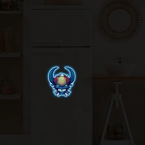 Close-up of a blue glowing skull sticker for Halloween window and fridge decoration