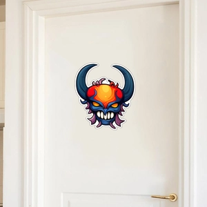 Luminous Halloween monster head sticker with devil horns on a white indoor door