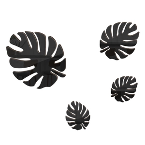 Set of four 3D acrylic monstera leaf wall art decorations with black mirror finish