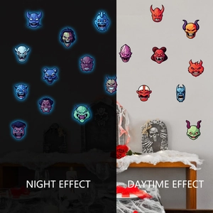 Glow-in-the-dark Halloween monster wall stickers showing day and night contrast effect