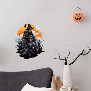 Adesivo murale Halloween con castello infestato e luna arancione sulla parete