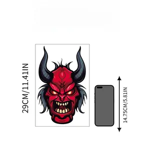 Size comparison showing 29cm red demon ghost wall decal next to a 14.75cm mobile phone