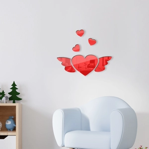 Detailed view of red mirror acrylic heart with wings wall sticker for living room decor