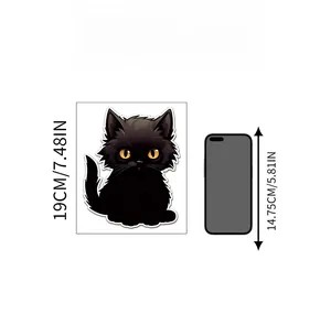 Size comparison detail showing the 19cm black cartoon cat wall sticker next to a smartphone