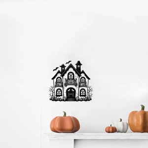 Halloween wall sticker featuring a haunted house with pumpkins and flying bats for party decor