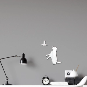 Modern dog and hummingbird mirror wall stickers shown above a minimalist desk setup