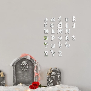 Detail view of 26 alphabet mirror wall stickers with cat silhouettes for nursery decor