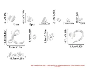 Macro view of mirror acrylic silver heart and Love letter wall stickers with measurements