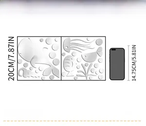 Detail view of silver acrylic fish wall decals with 20cm size reference for scale