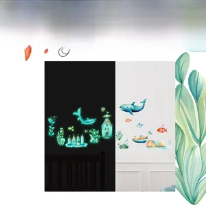 Glow-in-the-dark ocean fish wall stickers showing day and night visual effects comparison
