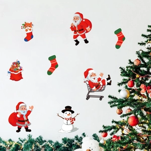 Christmas wall decal set featuring Santa Claus, snowman, and festive stockings on white wall