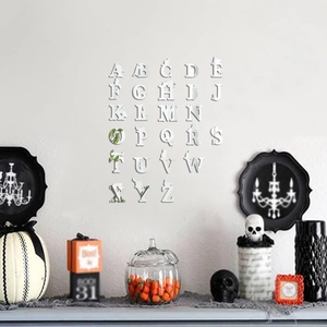 Detail of silver acrylic mirror wall stickers with Halloween cat and ghost alphabet designs