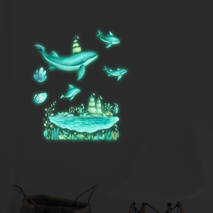 Luminous underwater world wall stickers with glow-in-the-dark whale and dolphin motifs