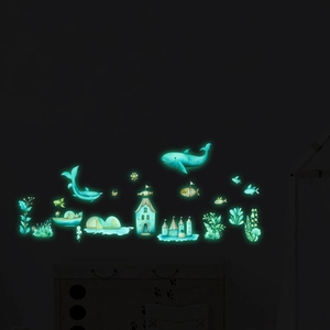 Luminous ocean themed wall stickers featuring glowing whales and fish for kids' rooms