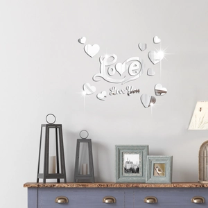 Detailed view of silver acrylic mirror wall stickers with Love script and heart shapes