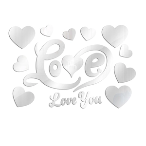 Close-up of mirror silver acrylic wall stickers featuring Love You text and heart shapes